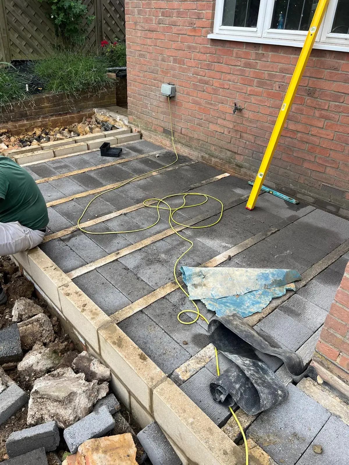 Beam-and-block floor going in against an existing house during an extension