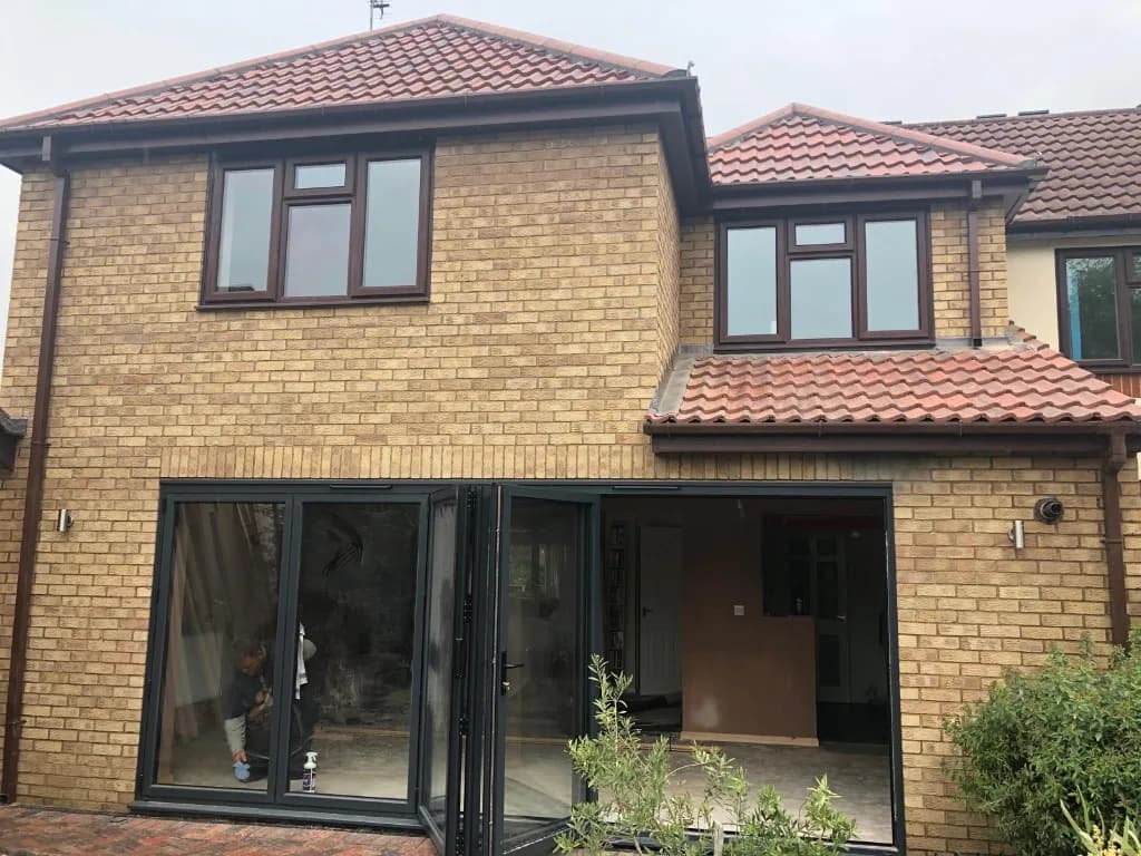 Double-storey rear extension with anthracite bifold doors